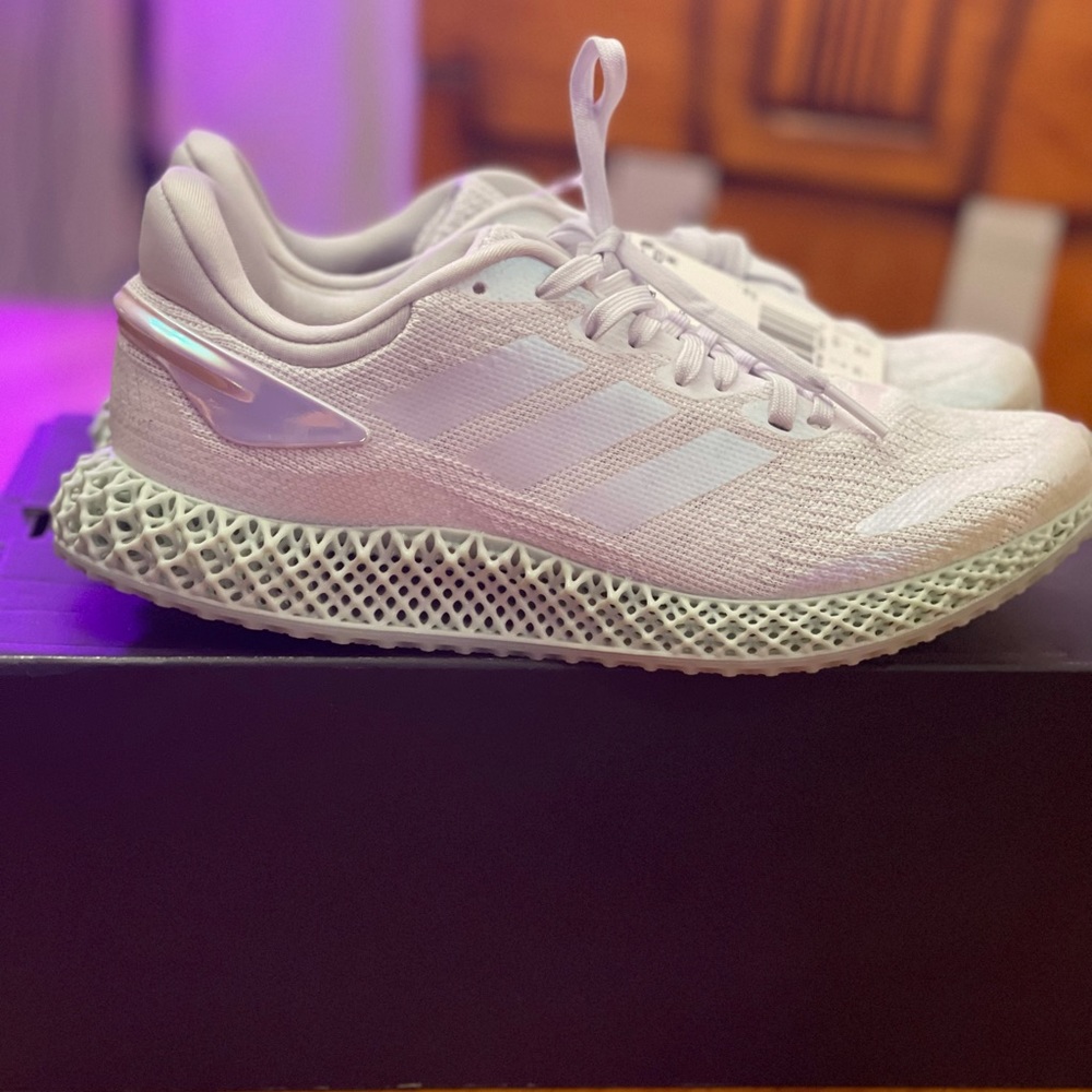 3D printed midsole. upper is made with Primeblue-made with Parley Ocean Plastic